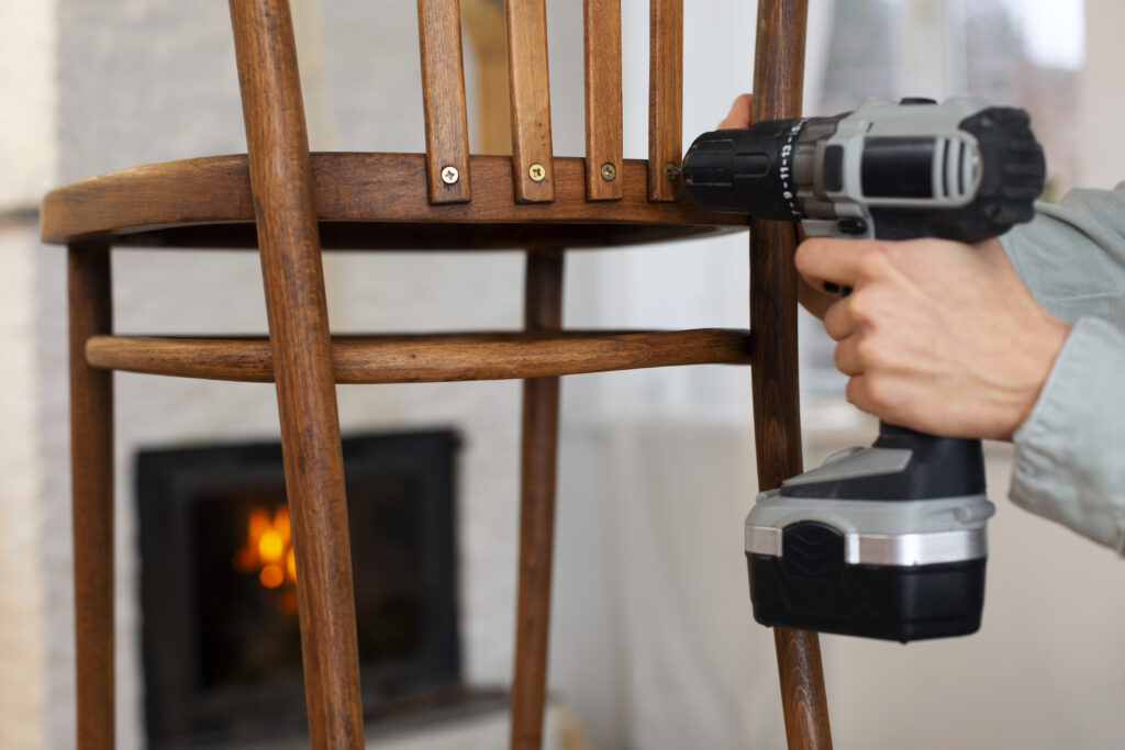 assembling chair with screws and drill machine