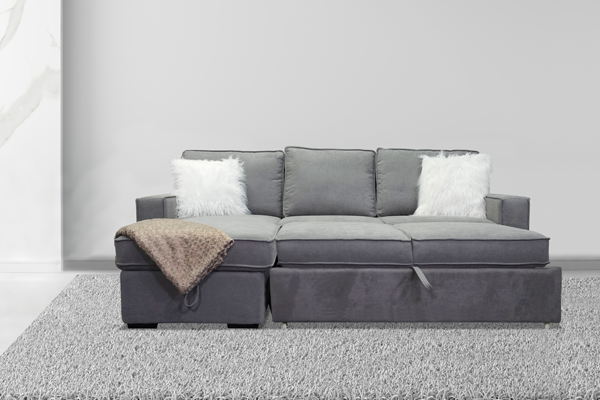 A sleeper sofa expand into a twin size bed for sleeping